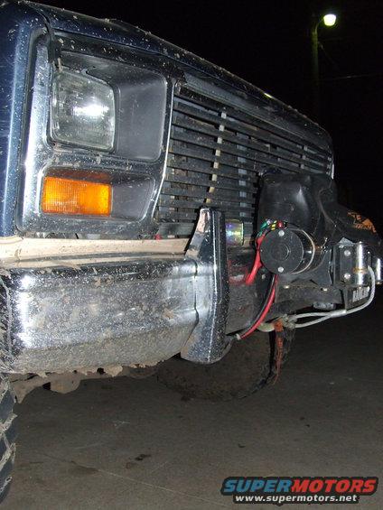 1986 Ford Bronco front bumper with a winch attached