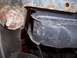 1978 Ford Bronco - Close-up of a corroded body mount and radiator bracket.
