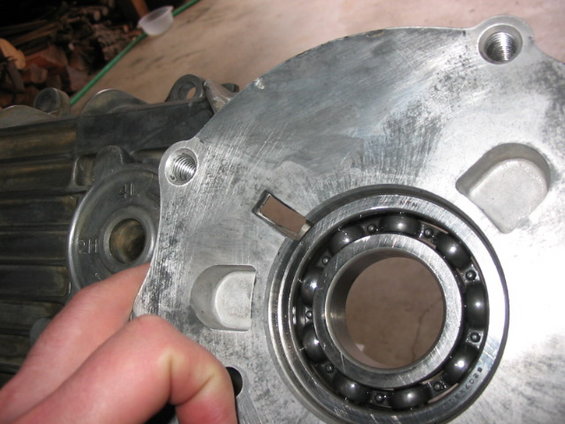 109_0987.jpg make sure when you are putting the rear Tcase nose piece back on you don't cover that rectagular hole with sealer.  That's a passage for fluid.