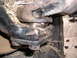 1985 GMC Jimmy - Worn ball joint showing significant dirt and debris accumulation.