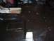 1978 Ford Bronco - The interior floor pan of a vehicle appears to have been recently coated or painted.