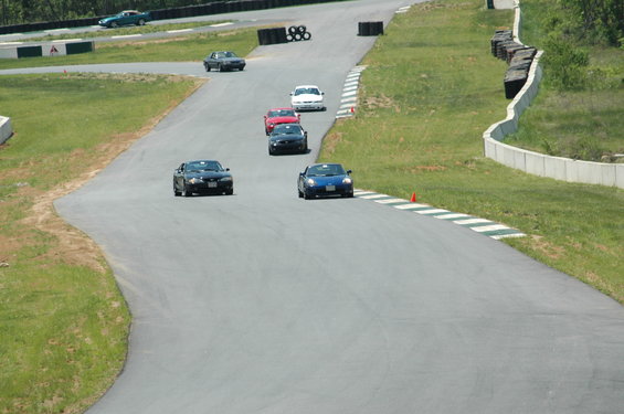 Black 1993 Ford Mustang on race track