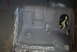 1994 Ford Bronco - Vehicle undercarriage after rust treatment and coating application.
