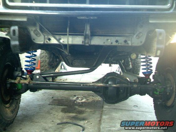 front axle and suspension components of a lifted truck