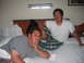 1980 Ford Bronco - Two men are relaxing on a bed in a hotel room.