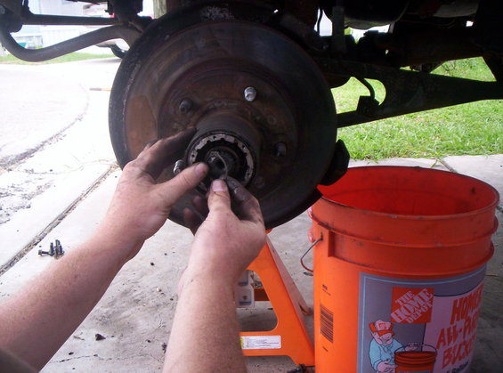 Removing Lock Washer 

*** Snap Ring Pliers *** will save you allot of time, and pain on your fingers. I had to use 2 allen wrenches, and allot of cusswords to remove this. 