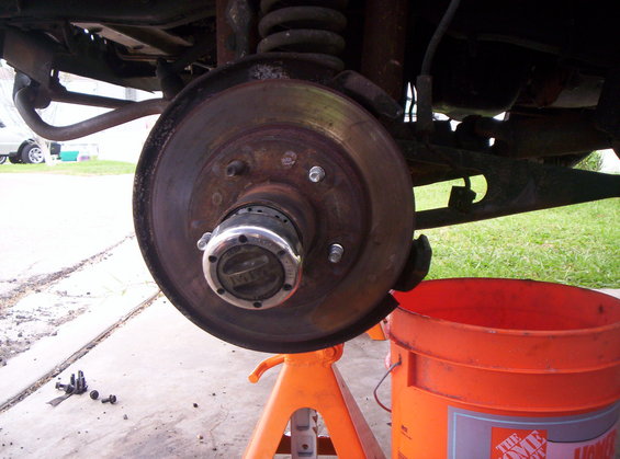 As you can see these are MM manual locking hubs. 

Remove the 6 Allen Bolts to be able to remove the Cap. 

I had to give it several love taps with a hammer to get it off. 