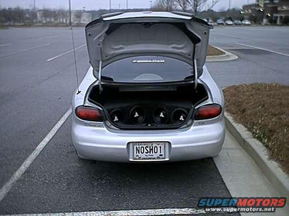 subs_in_trunk.jpg Picture of the 4 JL Audio 10W0's in the trunk