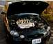 1999 Ford Taurus - It's got eight cylinders and uses 'em all, got overdrive, just won't stall.