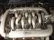 2000 Ford Taurus - The intake manifold of a Ford SHO engine is visible, showing "SHO 24 VALVE DOHC" markings.