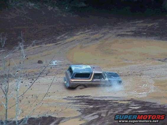 1978 Ford Bronco stuck in mud, 3q-front view