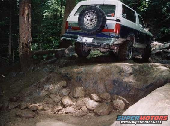 pict0033.jpg Brad has just made it up the ledge at Fain's Ford.