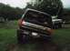 1987 Ford Bronco - From the back, it looks like we just broke our right rear spring! OR, we've just put 30 bags of concrete on the right r…