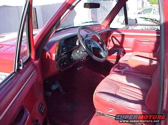 t7.jpg This is the stock interior.  The seats are going into the shop to be redone with the same cloth.  Now a Kenwood Mp3 player replaced the stock AM/FM cassette radio