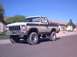 1979 Ford Bronco - This 1979 Ford Bronco features a two-tone tan and brown paint scheme and a prominent front grille.