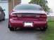 1998 Ford Taurus - Tips coming out from center of muffler like an SHO. Could use side-in/side-out muffler to have tip exit closer to facto…