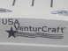 1991 Ford Bronco - Close-up of a VenturCraft logo on a white surface.