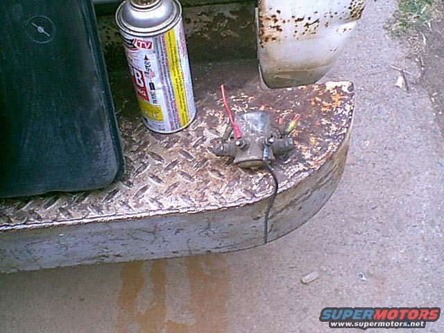 newrelay.jpg Hereis a continus duty relay. it can handle 80 amps all the time. the fan spikes @ 100 amps at startup and runs @ 26 amps. so standard plastic relays like to melt. I got this one from the junk yard off a limmo.