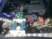 1965 Ford Mustang - Engine bay details with trophies displayed.