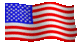 1960 Ford Falcon - American flag waving in the wind against a black background.