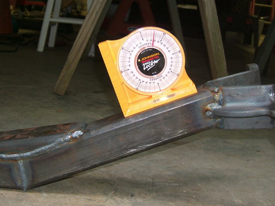 Yellow angle gauge on metal frame, reading 11 degrees