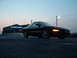 1995 Ford Probe - Black 1995 Ford Probe parked in front of the Two Branch Marina building.