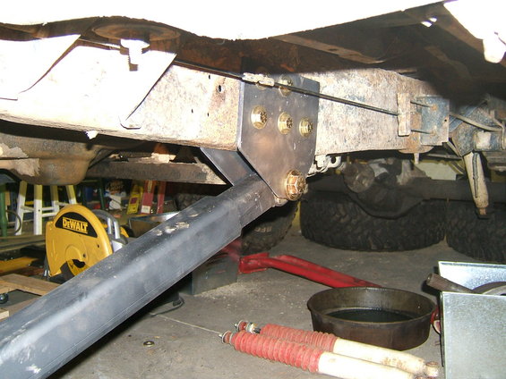 underbody of vehicle with custom suspension bracket and shocks
