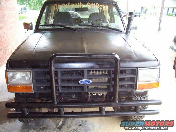 Black 1989 Ford Bronco II with a brush guard and snorkel, front view