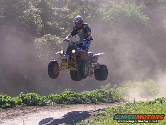 2001 Yamaha BANSHEE quad bike airborne with rider