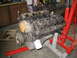 1979 Ford F-150 - Engine removed from a vehicle and mounted on an engine stand for repair or rebuilding.