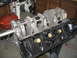 1979 Ford F-150 - Close-up view of an engine block and crankshaft assembly, likely a Ford 460 V8, in a workshop setting.