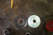 1995 Ford Taurus - Comparison of a worn brake rotor with a new slotted performance rotor, likely for an engine refresh or swap project.