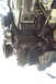 1995 Ford Taurus - Close-up of engine components, including pulleys and mounting brackets.