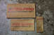 1995 Ford Taurus - Cardboard packaging for Fel-Pro gaskets is laid out on a textured concrete surface.