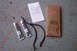 1995 Ford Taurus - The image displays automotive parts including sealant tubes, a hose, and a boxed component, along with an instruction manual.
