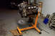 1995 Ford Taurus - Engine removed from a vehicle and placed on an engine stand for service or replacement.