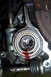 1995 Ford Taurus - Engine part showing a leak of red fluid from a central opening.