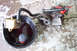 1995 Ford Taurus - A power steering pump and reservoir are shown removed from a vehicle and placed in a drain pan.