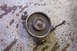 1995 Ford Taurus - A pulley assembly with bolts is shown on a concrete floor.