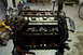1995 Ford Taurus - Engine assembly on a stand, ready for refresh or swap, with visible camshafts and valve train components.