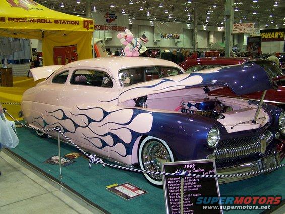 1949 Mercury Custom hot rod, pink with blue flames, hood open