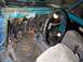 1972 Ford Bronco - The interior of a vintage vehicle shows exposed wiring and a worn steering wheel, suggesting a project in progress.