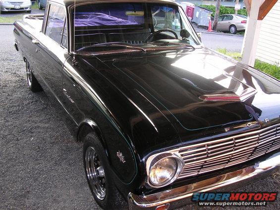 Black 1963 Ford Ranchero parked outside