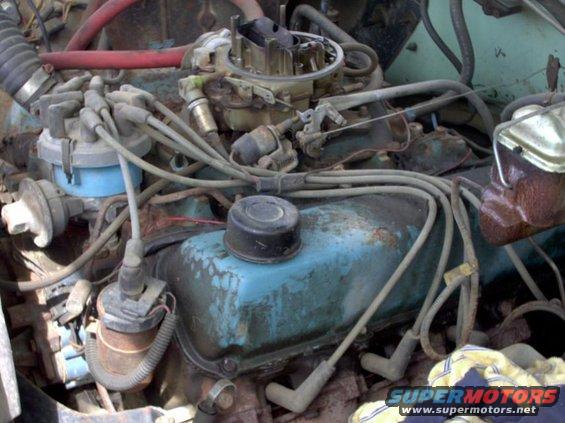 Engine bay with carburetor and distributor