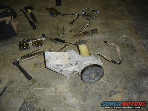 Old pump and bracket out.