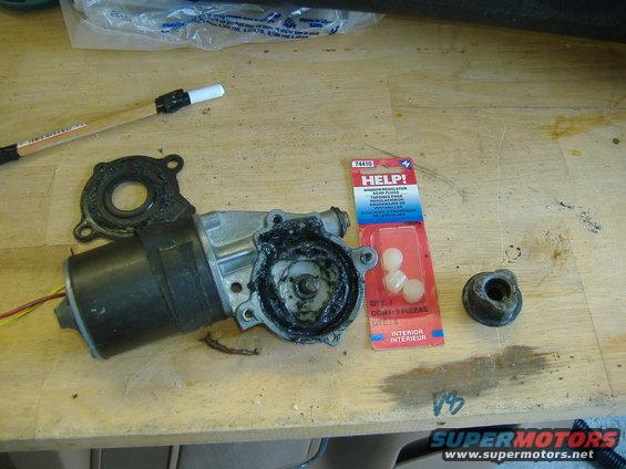 Symptom: Motor sure sounds like it's working, window goes nowhere.  Solution: little pastic bushings - $10.00

There is really only three things to the motor - the motor, the gear and the cog and three plastic bushings that like to break up into 1000s of little pieces inside over time.  I thought the motor was off track, but I took it out, held gear with plyers while in operation, and I could stop the gear from turning.  The bushings make it go.  Don't spend the $60 for a new motor if it's still running.

Take the motor out..... Pull the door skin off and you'll see a nice size hole in the sheet metal.  Inside the hole, you'll partly see the motor and the three bolts that hold it in.  I've read some guy in Superford that said to grind out the rivets of the window track to remove the motor.  Holy shit don't do that.  Look at the next page....