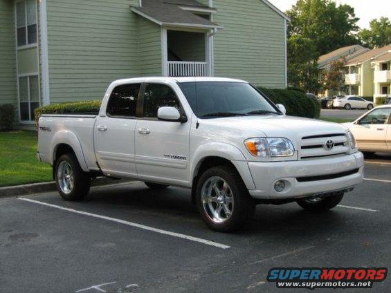 White Toyota Tundra pickup truck parked in a lot