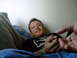 1980 Ford Bronco - A man relaxes on a couch, with a hand reaching towards the camera.