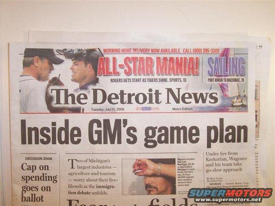 Newspaper front page with headline 'Inside GM's game plan' and 'The Detroit News' masthead