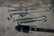 1995 Jeep Cherokee - Set of tie-down straps and hardware laid out on a concrete surface.